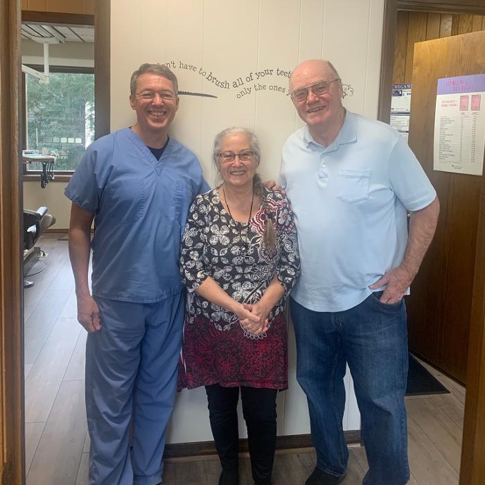 Dr. Mark with two patients