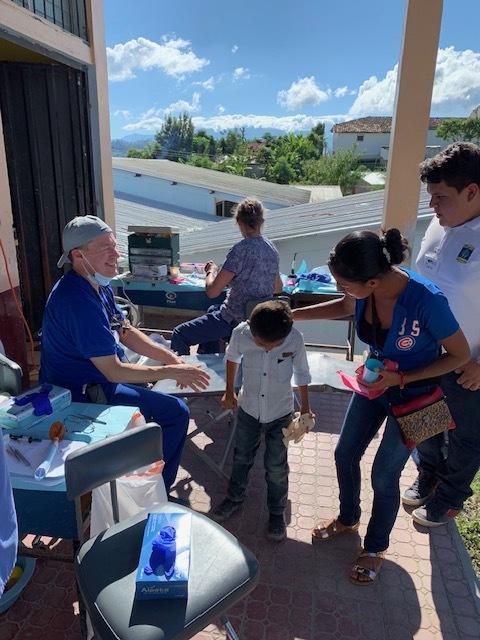 dr richardson handing out donations
