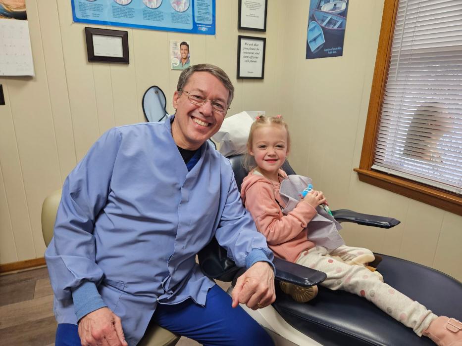 Dr. Mark and a young patient in our Kalamazoo dental office