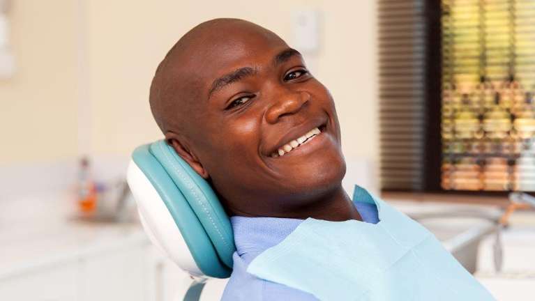 kalamazoo man smiling in dental chair