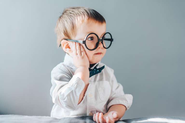 young boy with glasses